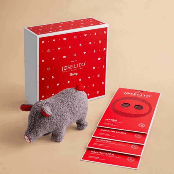 Celebrate a newborn with the Joselito Baby Box. 100% natural Iberian meats and a cute plush toy — the perfect gourmet gift for parents and families.